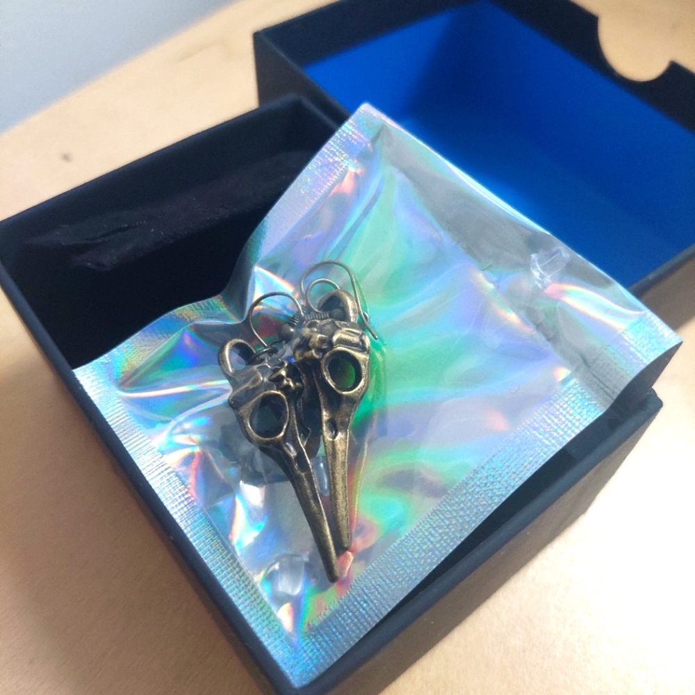 Steampunk bird skull earrings